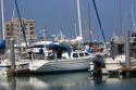 In slip with Air X wind generator seen on transom